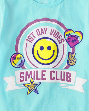 Camiseta con gráfico Smile Club para niñas