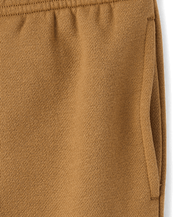 Pantalones jogger tipo cargo de polar para niños
