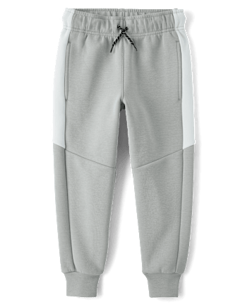 Pantalones jogger de neopreno con rayas laterales para niños