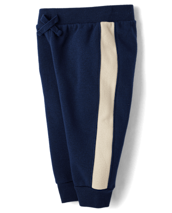 Pantalones deportivos de polar con rayas laterales para bebés y niños pequeños