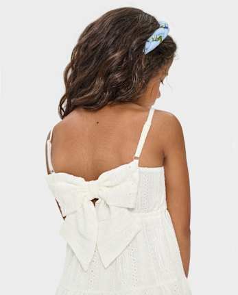 Robe à volants avec nœud au dos et œillets pour fille