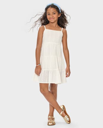 Robe à volants avec nœud au dos et œillets pour fille