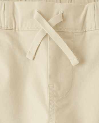 Pantalon chino extensible à revers roulés pour garçon