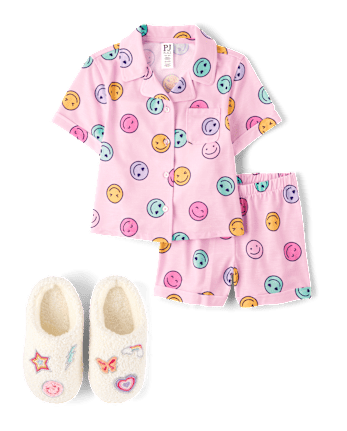 Pyjama boutonné arc-en-ciel pour fille avec visage heureux