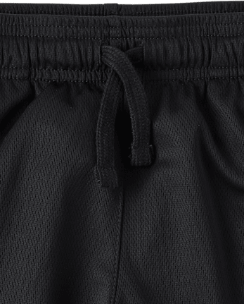 Short de sport en maille à séchage rapide et ourlet contrasté pour garçon