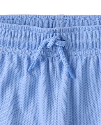 Short de sport enfant à séchage rapide et bandes latérales en maille