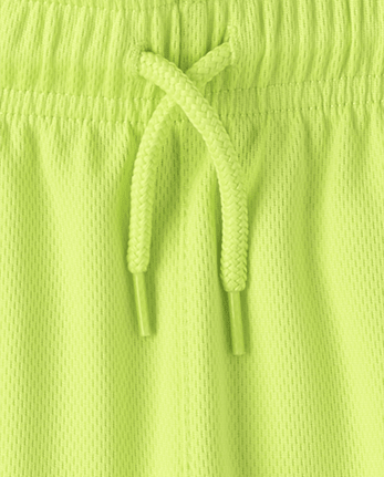 Short de sport pour enfants à séchage rapide et bandes latérales en maille