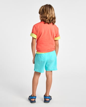 Short de bain pour garçon à séchage rapide en tissu ripstop, idéal pour la piscine et les jeux.