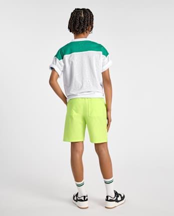 Short de bain pour garçon à séchage rapide en tissu ripstop, idéal pour la piscine et les jeux.