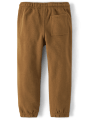 Pantalones jogger de forro polar con renos bordados para niños - Cabina de Navidad