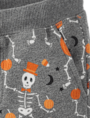Pantalones jogger de forro polar con esqueleto para niños - Halloween