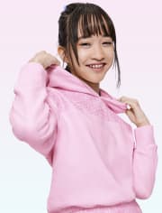 Sudadera con ojal