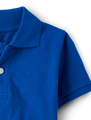 Polo de piqué de uniforme para bebés y niños pequeños