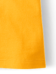 Polo de piqué de uniforme para niñas