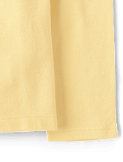 Polo de piqué con volantes de uniforme para niñas