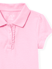 Polo de piqué con volantes de uniforme para niñas