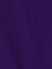 Polo de piqué con volantes de uniforme para niñas