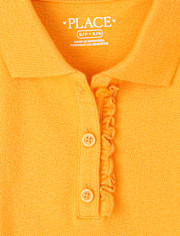 Polo de piqué con volantes de uniforme para niñas