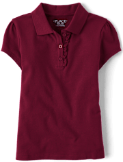 Polo de piqué con volantes de uniforme para niñas