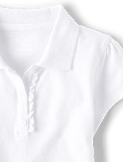 Polo de piqué con volantes de uniforme para niñas