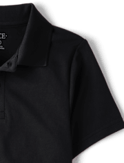 Polo de rendimiento de uniforme para niños