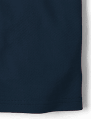 Polo de performance uniforme pour garçon