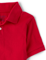 Polo de jersey suave de uniforme para niños