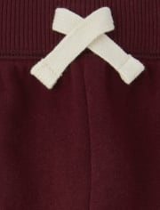 Pantalones deportivos de polar a rayas activos para bebés y niños pequeños