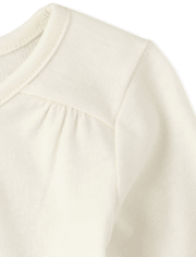 Haut orné pour bébés et petites filles