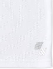 Haut de performance en maille Mix and Match pour garçon
