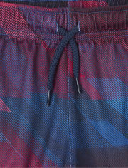 Shorts de baloncesto de alto rendimiento de malla para niño