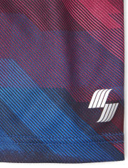 Shorts de baloncesto de alto rendimiento de malla para niño