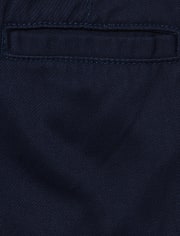 Pantalones ajustados perfectos elásticos resistentes a las manchas y a las arrugas de uniforme para niños