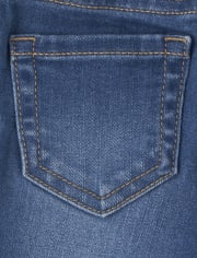 Jeans ajustados con cinturón trenzado para bebés y niñas pequeñas