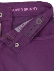Jeans superajustados con dobladillo escalonado para niñas
