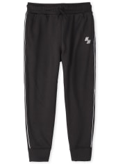 Pantalones jogger de malla con rayas laterales para niños