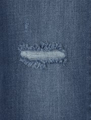 Jeans rectos de mezclilla desgastada con puños deshilachados para niñas