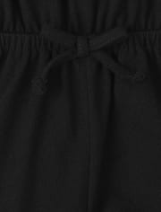 Barboteuse à volants mignonne et impertinente pour bébés et petites filles