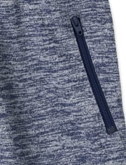 Pantalones cortos de rizo francés que absorben la humedad para niños