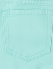 Shorts skimmer de sarga con puño enrollado para niñas