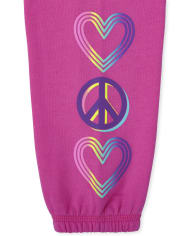 Pantalones jogger de forro polar con corazones arcoíris para niñas