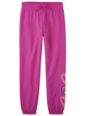 Pantalones jogger de forro polar con corazones arcoíris para niñas