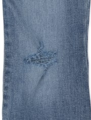 Jeans acampanados desgastados para niñas