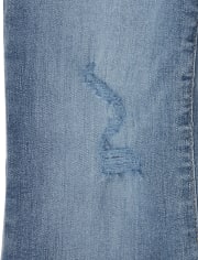 Jeans acampanados desgastados para niñas