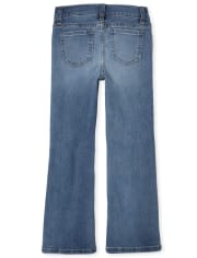 Jeans acampanados desgastados para niñas