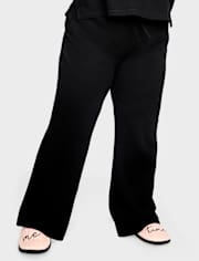 Pantalones térmicos acampanados para mujer
