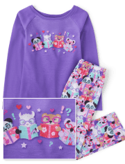 Pijamas de animales leyendo para niñas