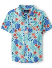 Camisa con botones tropicales familiares a juego para niños