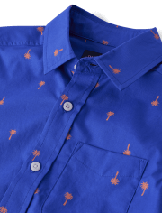 Camisa con botones de popelín con palmeras para niño