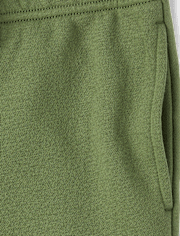 Pantalones jogger tipo cargo de polar para niños